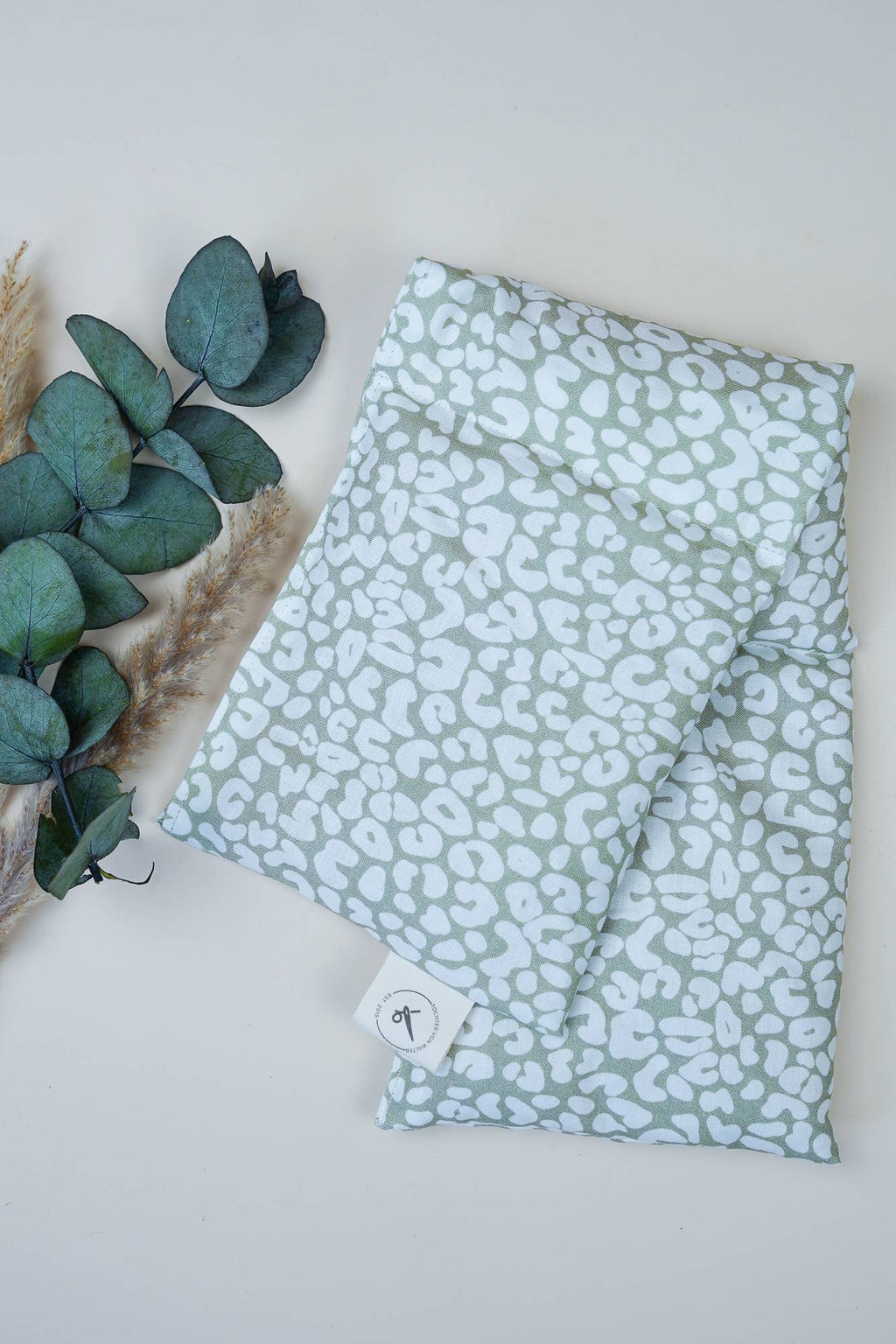 coussin thermique à motif lion